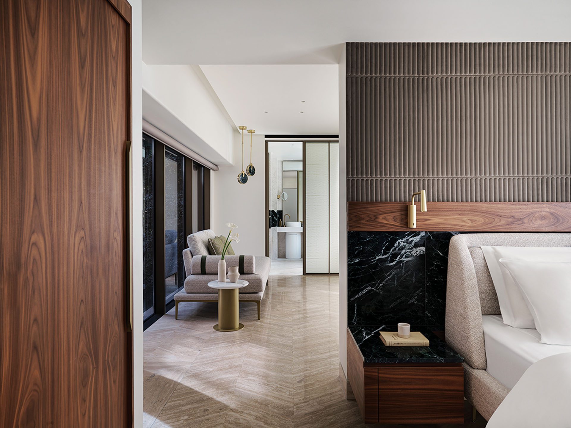 Anthology of Athens suite with oak panelling, fluted wall and dark marble