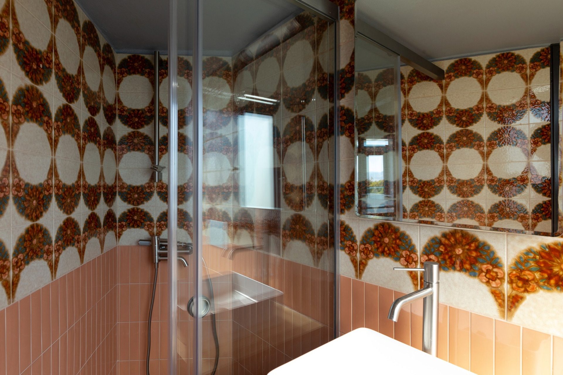 Bathroom with original patterned 1970s ceramic tiles, Duplex Residence in Athens