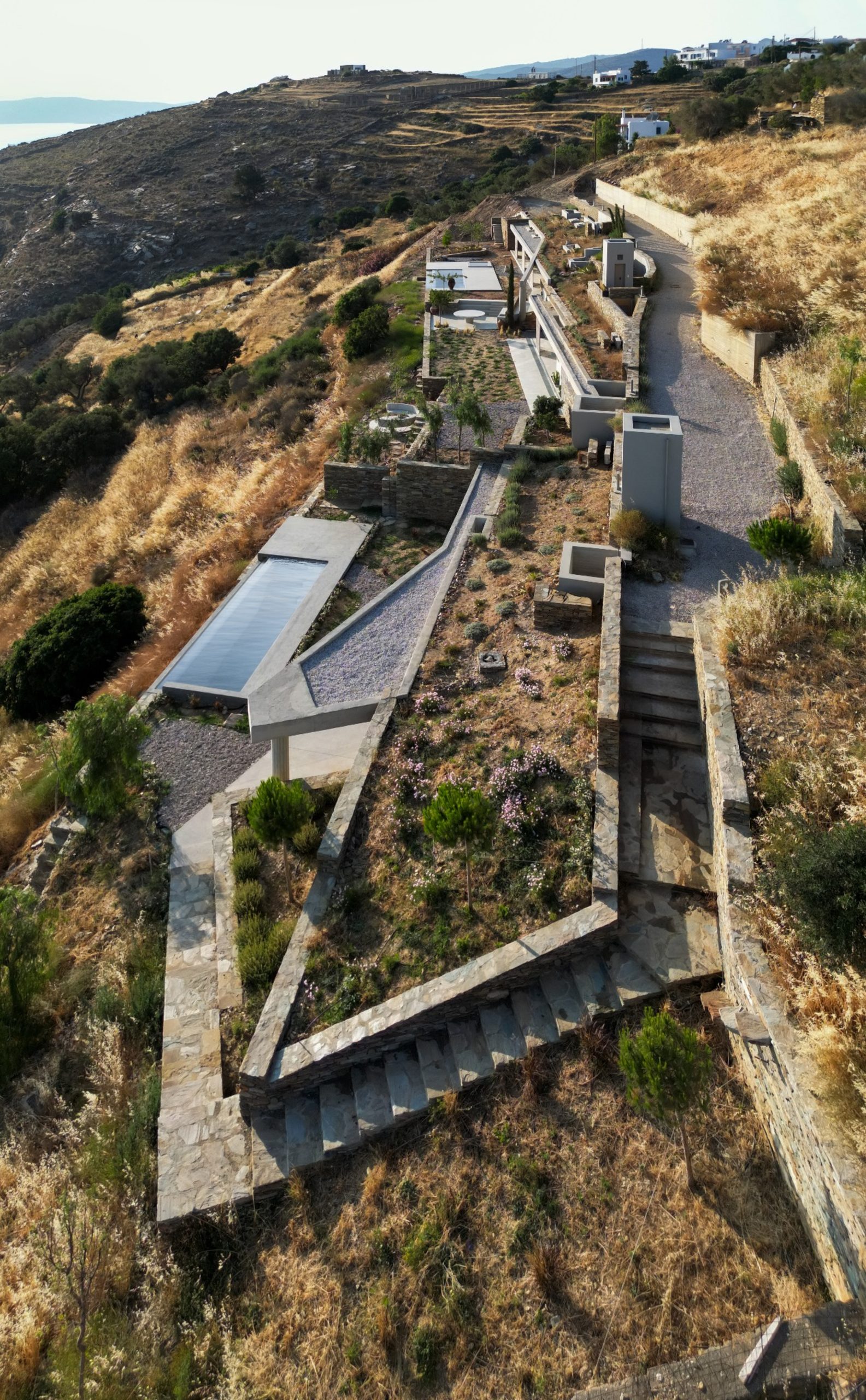Aerial view of stairways and linear skylights of The Passage in Andros
