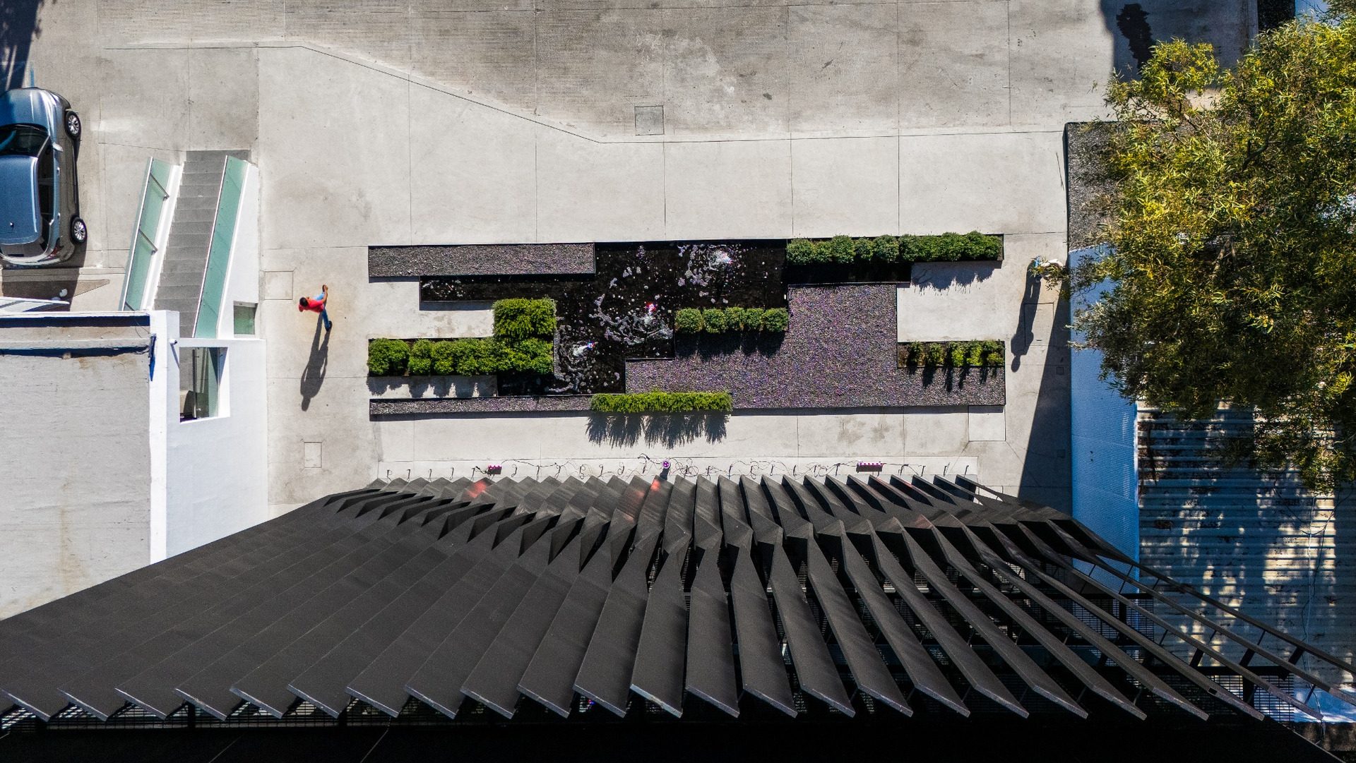 Aerial view of Torre Negra entrance with planting and water features