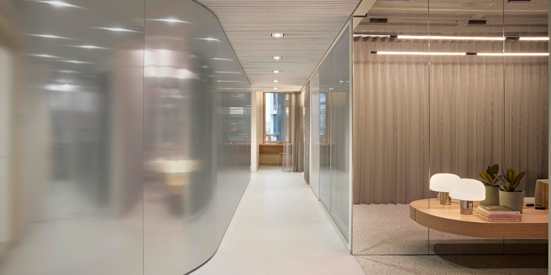 Curved glazed corridor and meeting rooms at BESTSECRET offices Munich
