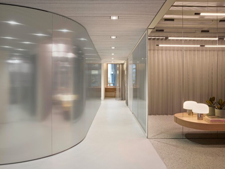 Curved glazed corridor and meeting rooms at BESTSECRET offices Munich