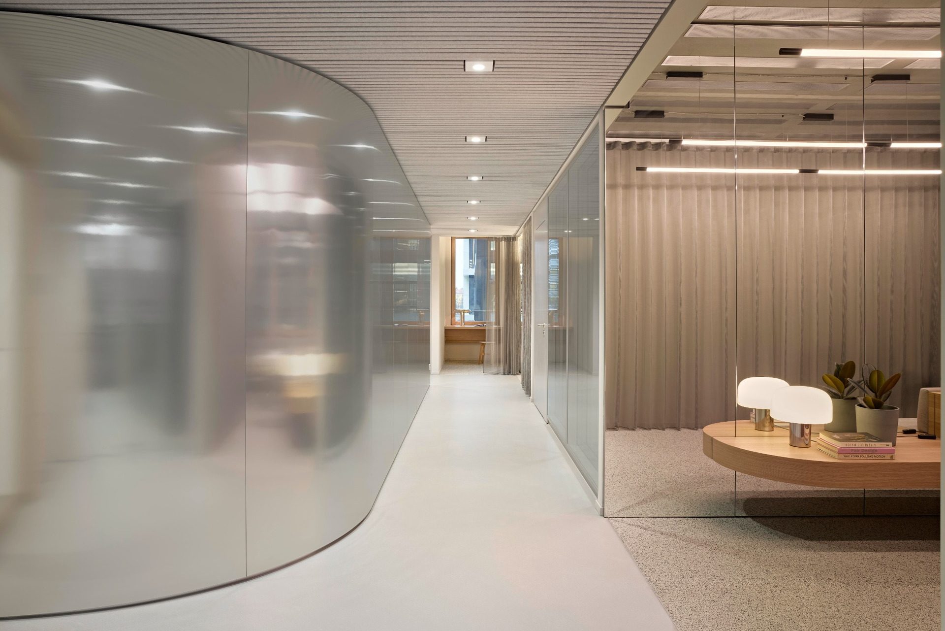 Curved glazed corridor and meeting rooms at BESTSECRET offices Munich