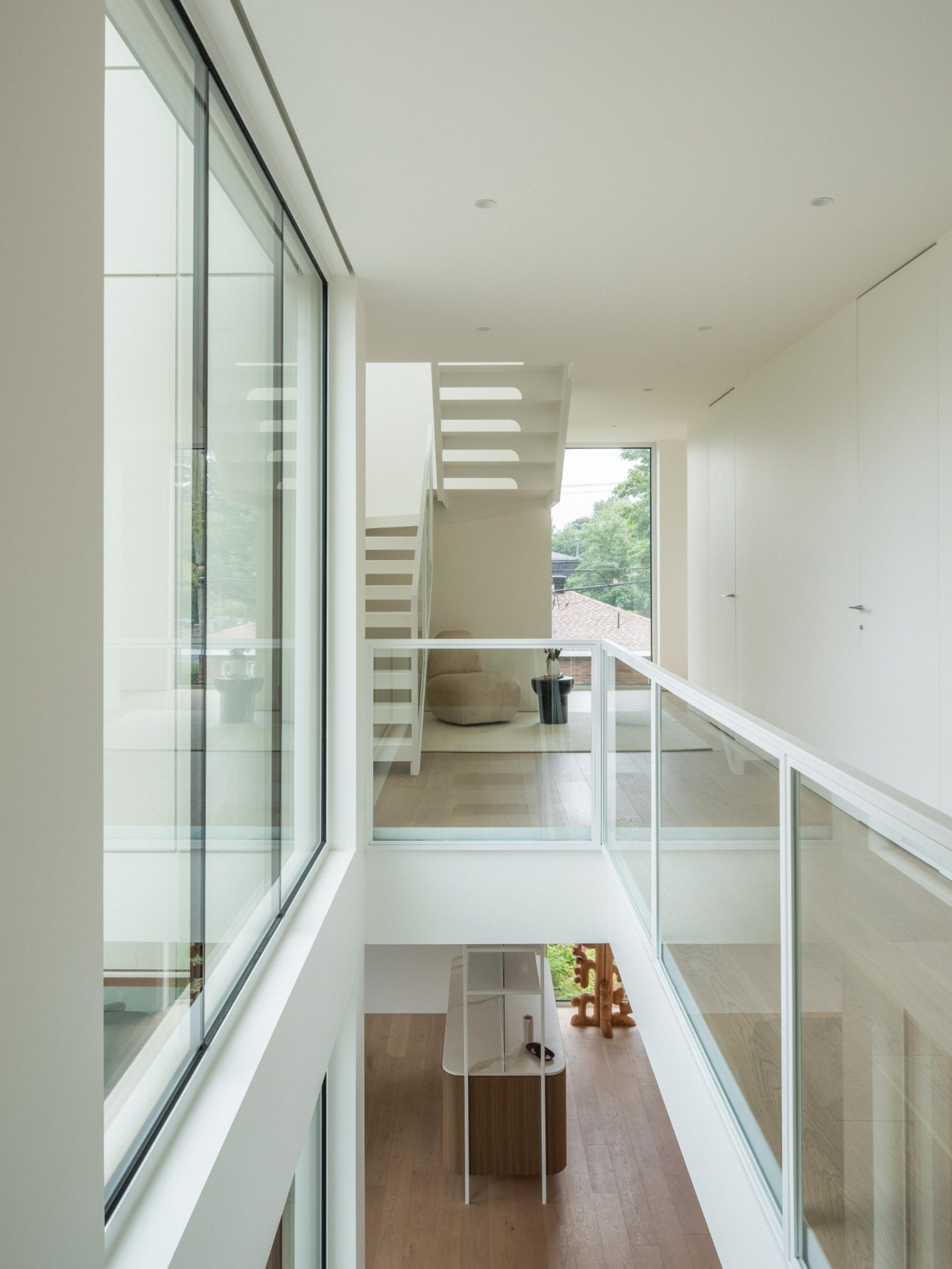 Mezzanine office overlooking the double-height void at The Lens