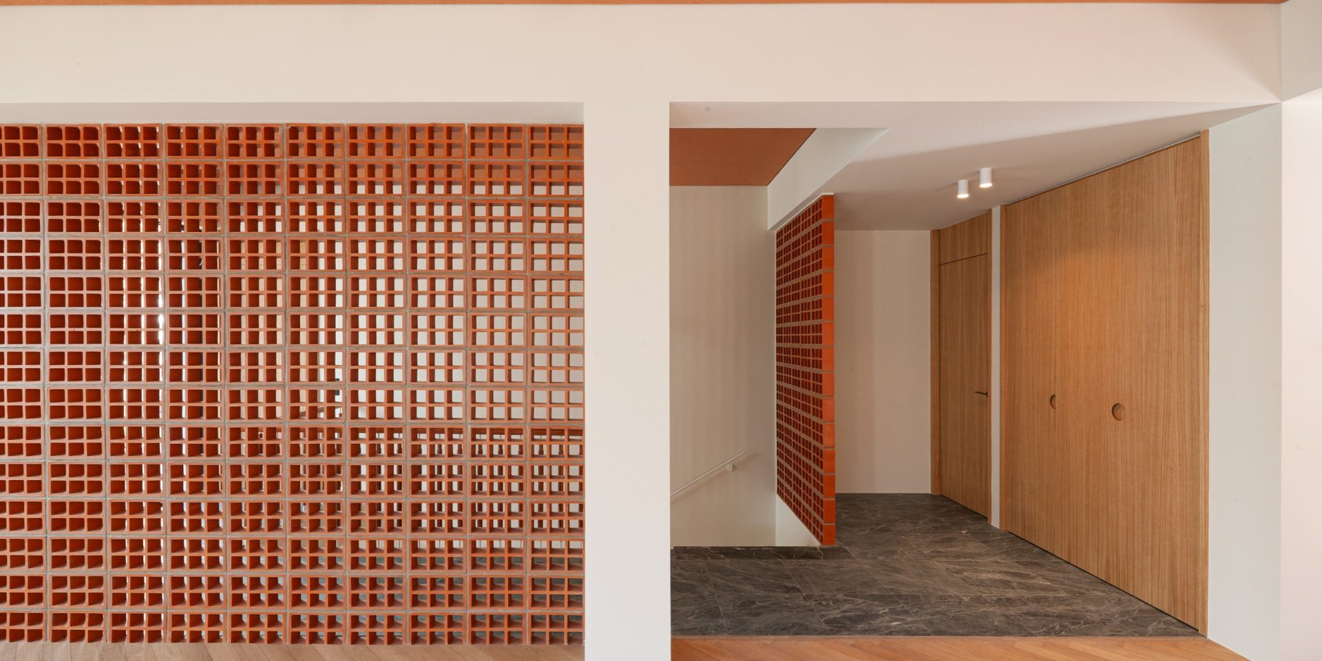 Residence Renovation in Chalandri ground floor with ceramic claustra and oak cabinetry