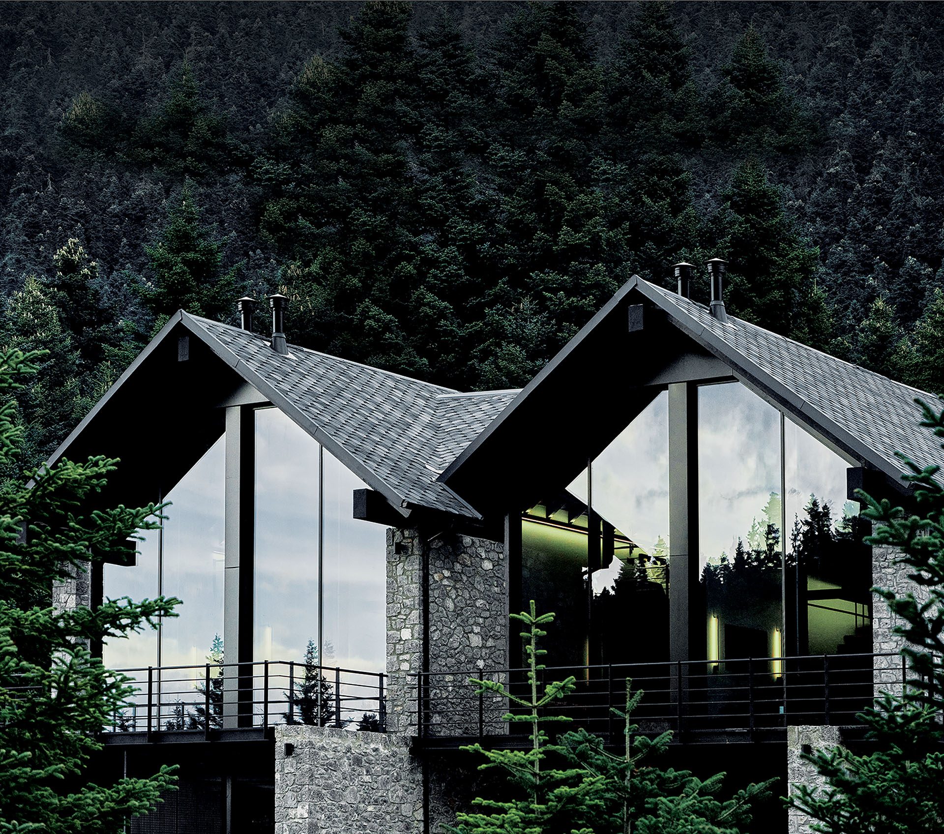 Hermitage 1310 glazed gables and stone walls among fir trees