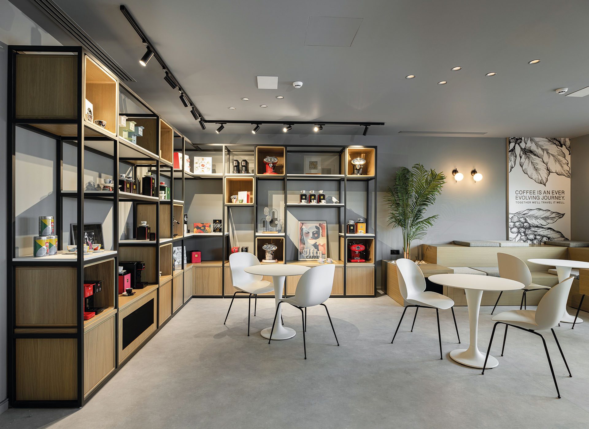 Product display shelving in timber and black metal at KAFEA TERRA offices
