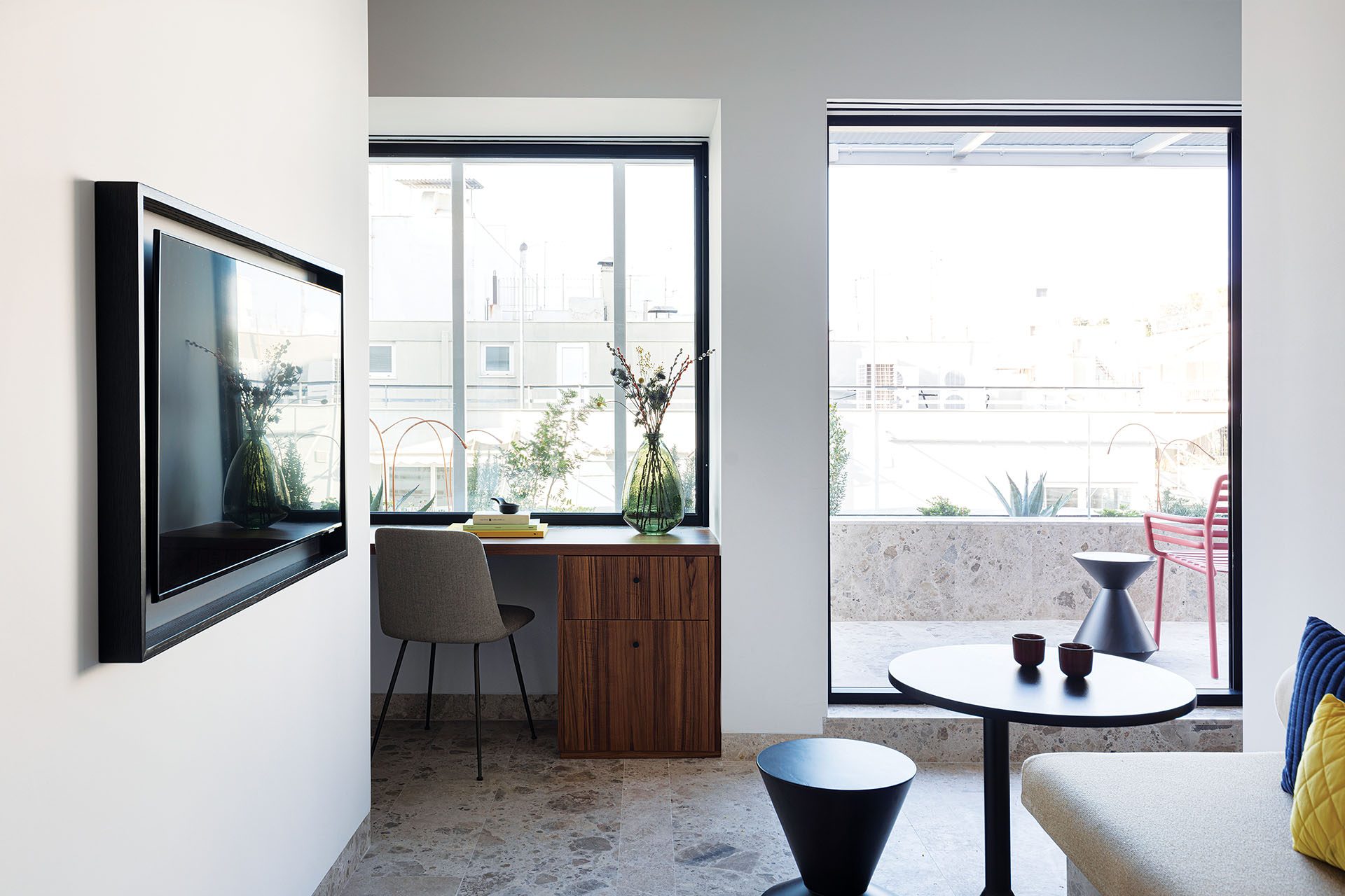 Guestroom with desk, terrace doors and city view at The Social Athens Hotel